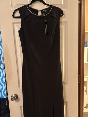 Elegant Black Sleeveless Maxi Dress with Beaded Neckline